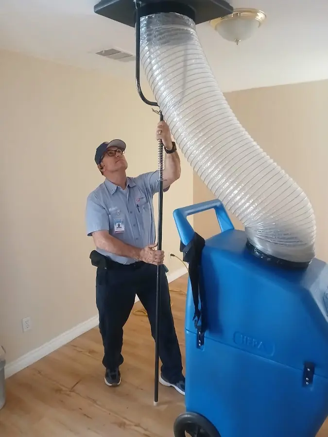 Furnace Tune-Up technician using HEPA equipment in Amarillo